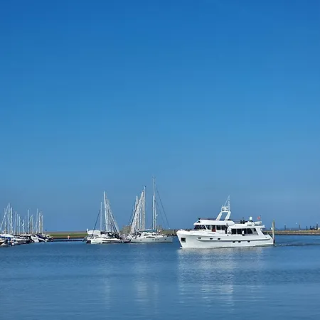 Ferienhaus Lüttje Uttiet Mit Eingezäunten Garten Berumbur